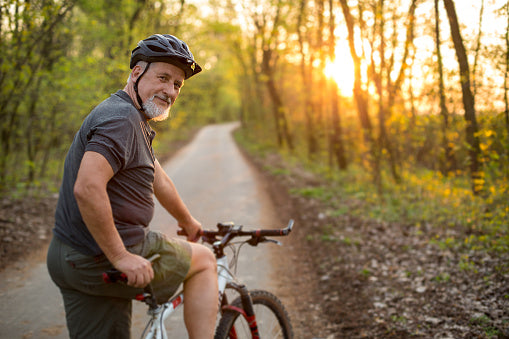 Old man riding electronic bike 